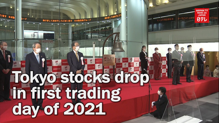 Tokyo stocks drop in first trading of 2021