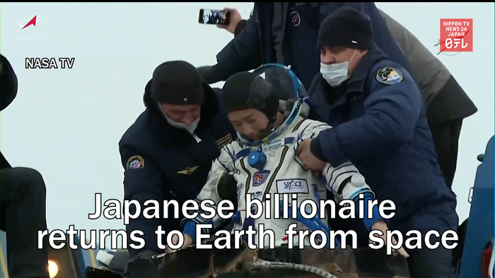 Japanese billionaire returns to Earth from space