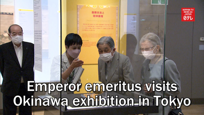 Emperor emeritus visits Okinawa exhibition in Tokyo