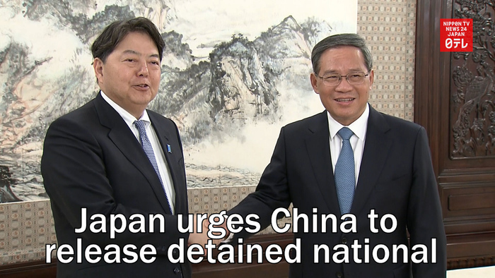 Japan urges China to release detained national