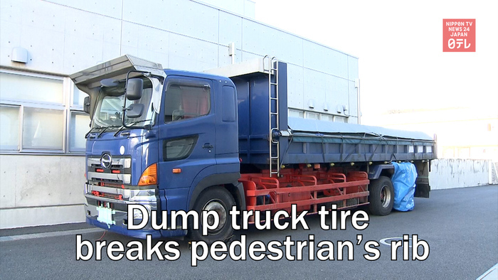 Dump truck tire breaks pedestrian's rib