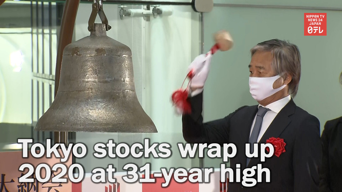Tokyo stocks end 2020 at 31-year high