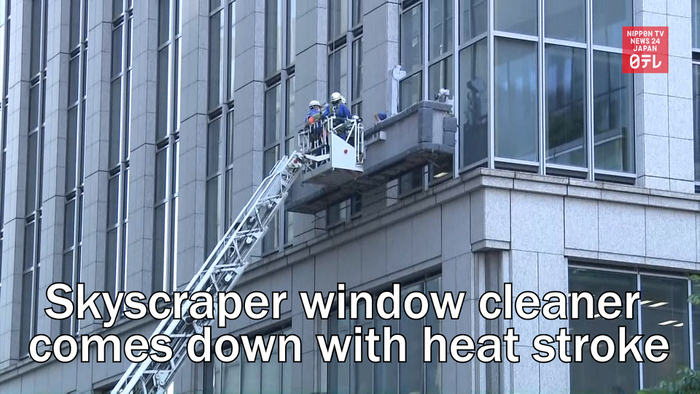 Skyscraper window cleaner comes down with heat stroke