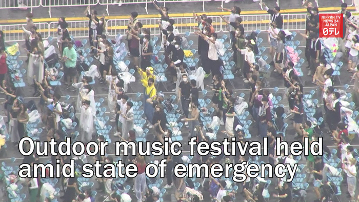 Outdoor music festival held amid state of emergency
