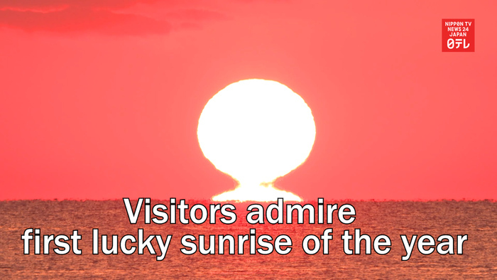 Visitors admire first lucky sunrise of the year