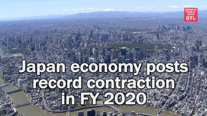 Japan economy posts record contraction in FY 2020